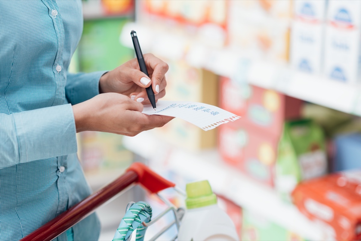 Woman Making a Grocery Shopping List {Shopping Tips}