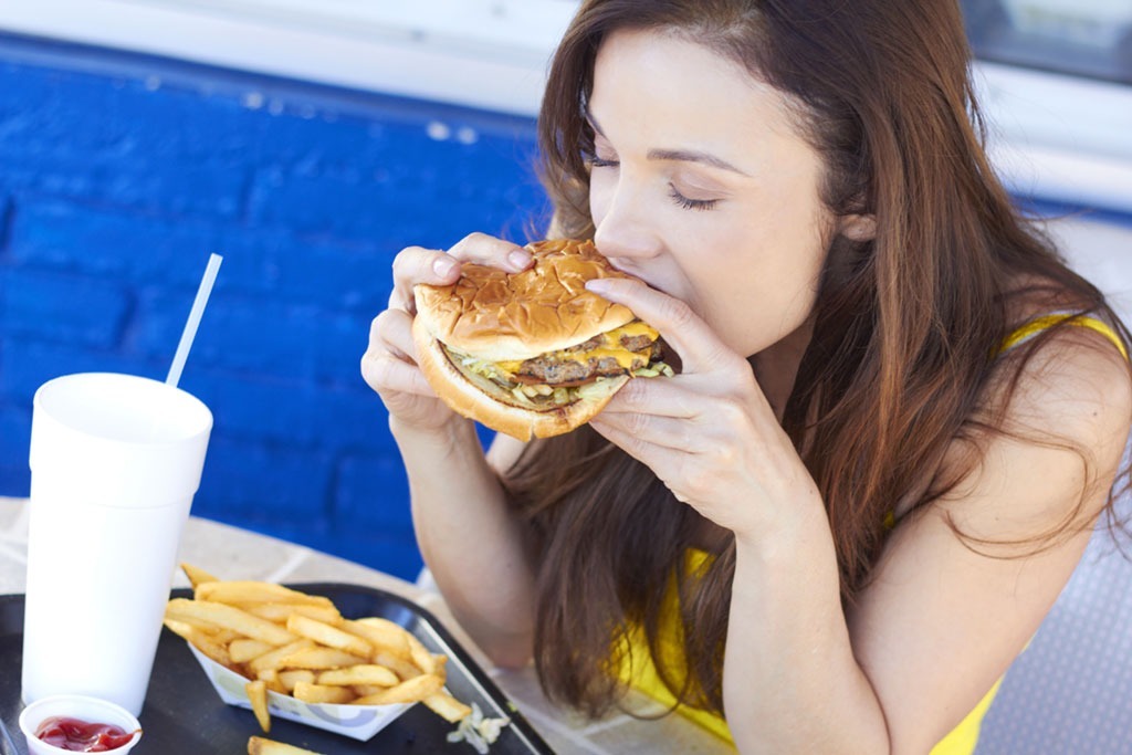 girl eating fast food