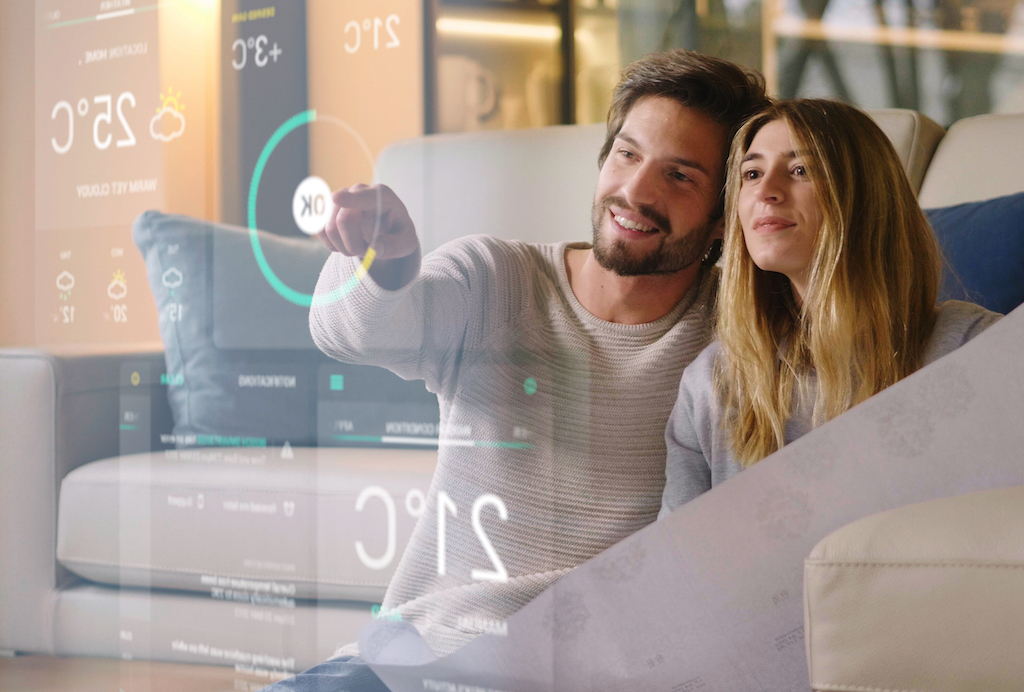 couple on a sofa in a smart home