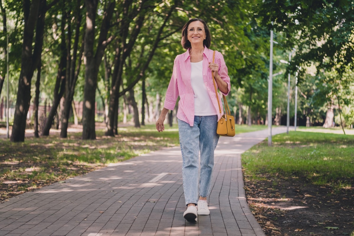 Woman Enjoying a Walk in Nature