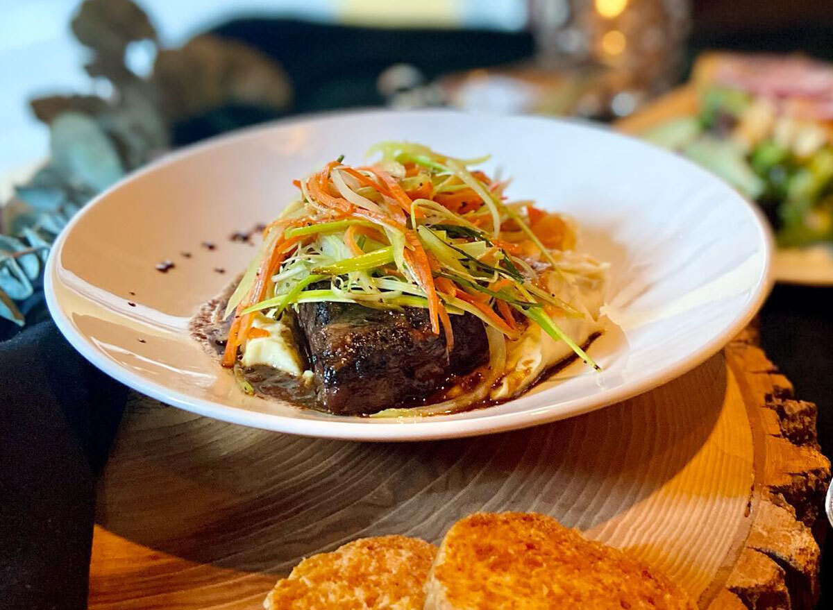 bowl of short ribs with cole slaw