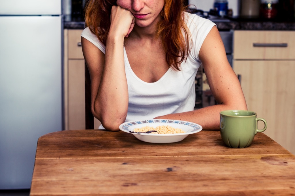 Woman Not Eating Her Food {Surprising Flu Symptoms}