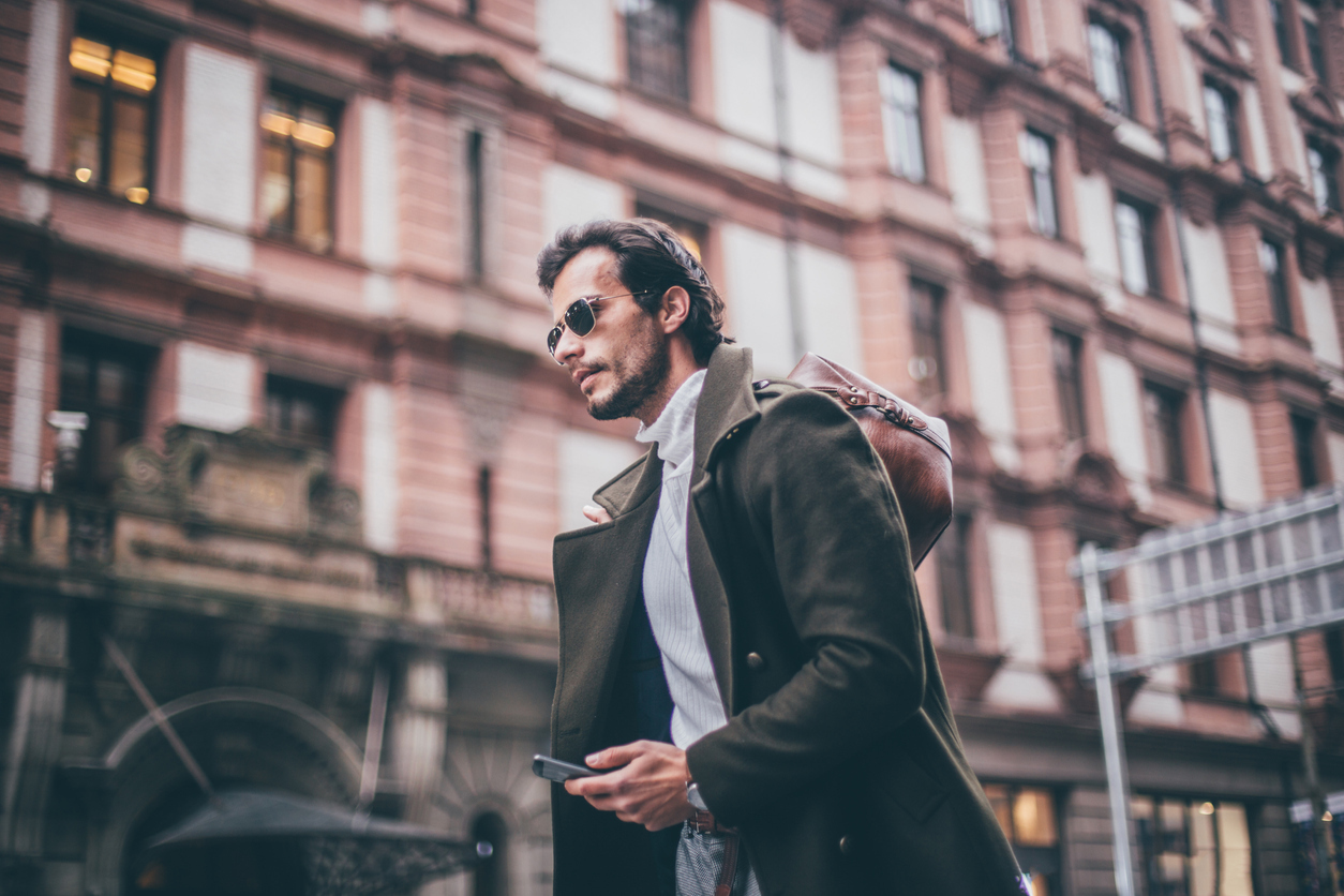 young man in trench coat jacket