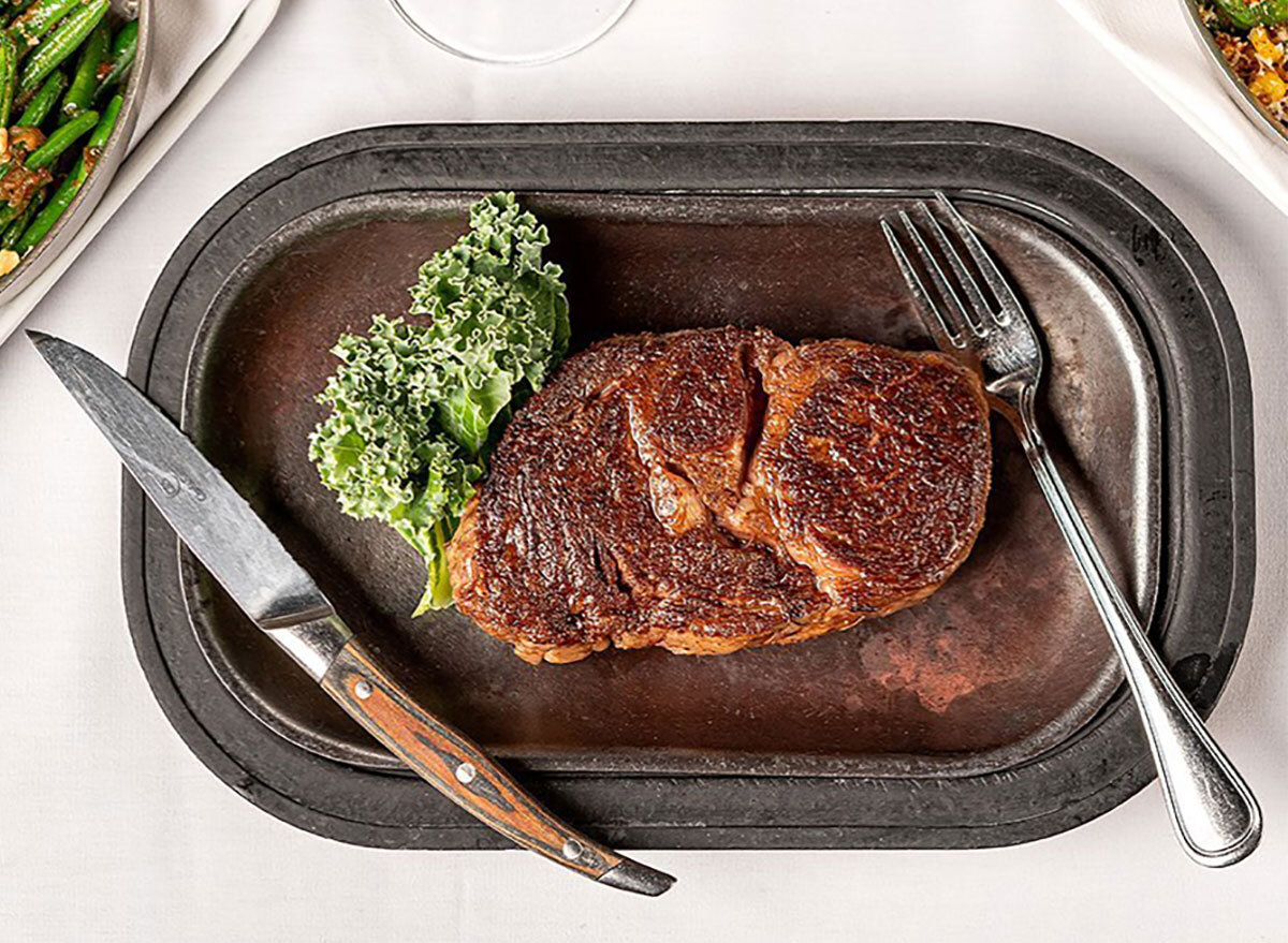 plate of steak with garnish