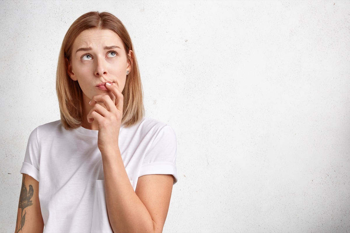 woman thinking over the word plethora, every day words