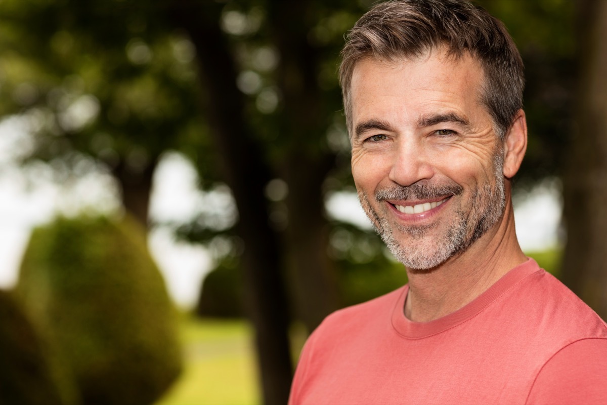 Mature Happy Man Smiling At The Camera