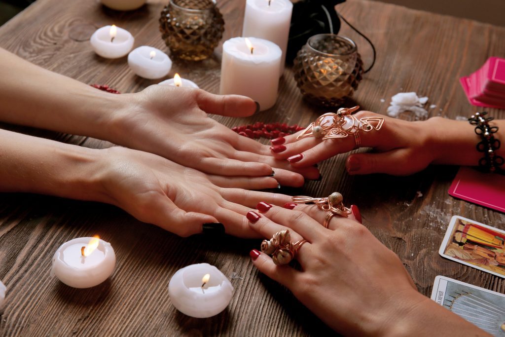 Woman having palms read