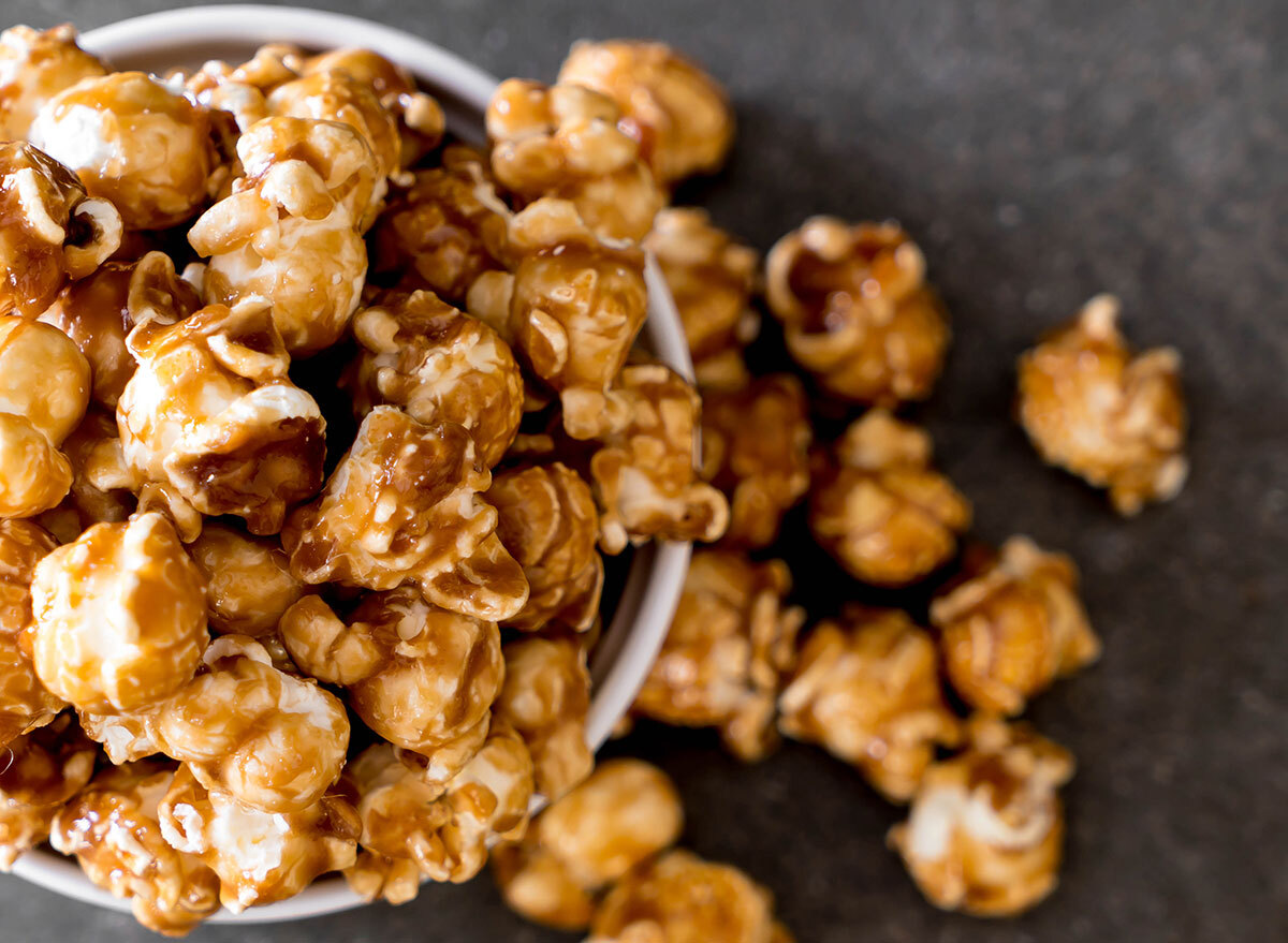 caramel popcorn in bowl spilling