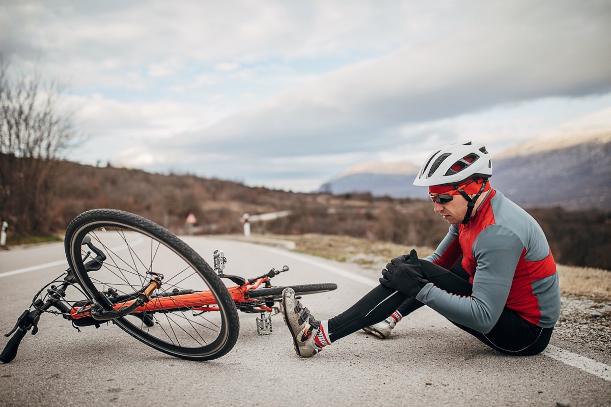 Man Falling Off His Bike