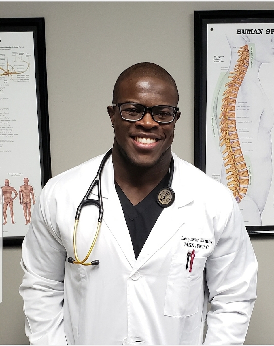 coronavirus survivor lequawn james in lab coat