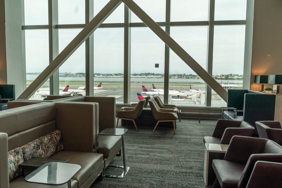 Airplanes seen through the windows of Sky Club as LaGuardia airport Terminal C during Governor Kathy Hochul announcement