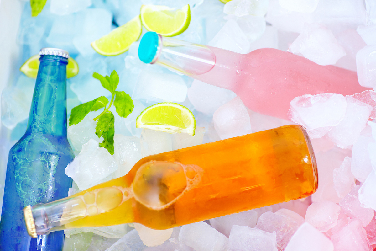 chilled colorful wine coolers in ice box