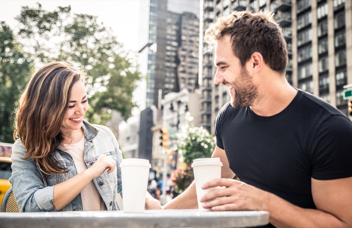 Man and woman flirting