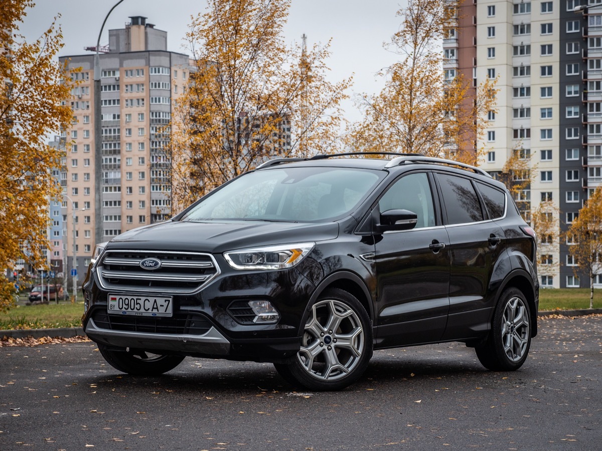 a black Ford Escape outside