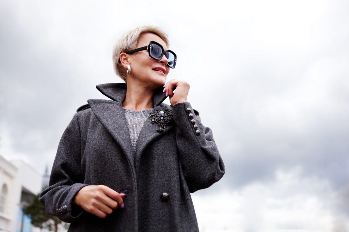 older woman wearing pea coat