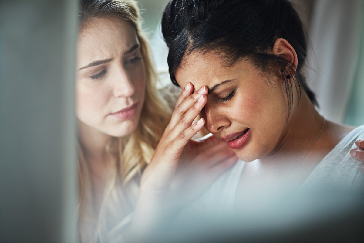 Shot of a young businesswoman consoling an upset colleague as they sit together in the office