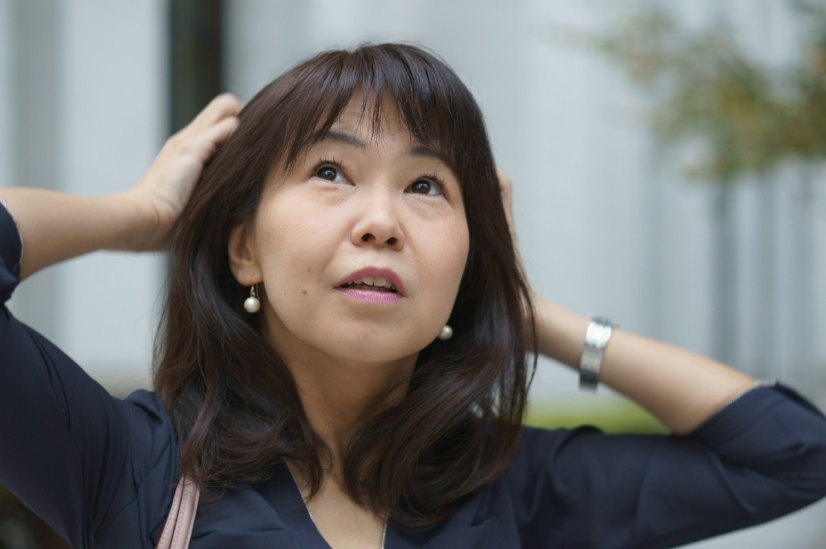 business woman wearing navy blue top