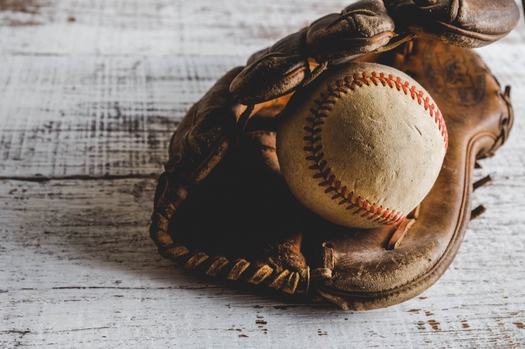 old baseball glove and ball