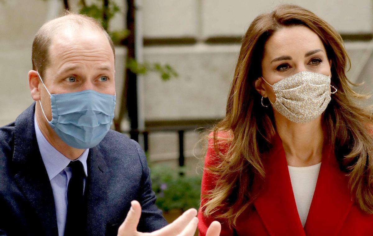 The Duke and Duchess of Cambridge talk with medical staff during a visit to St. Bartholomew's Hospital in London, to mark the launch of the Hold Still photography project.