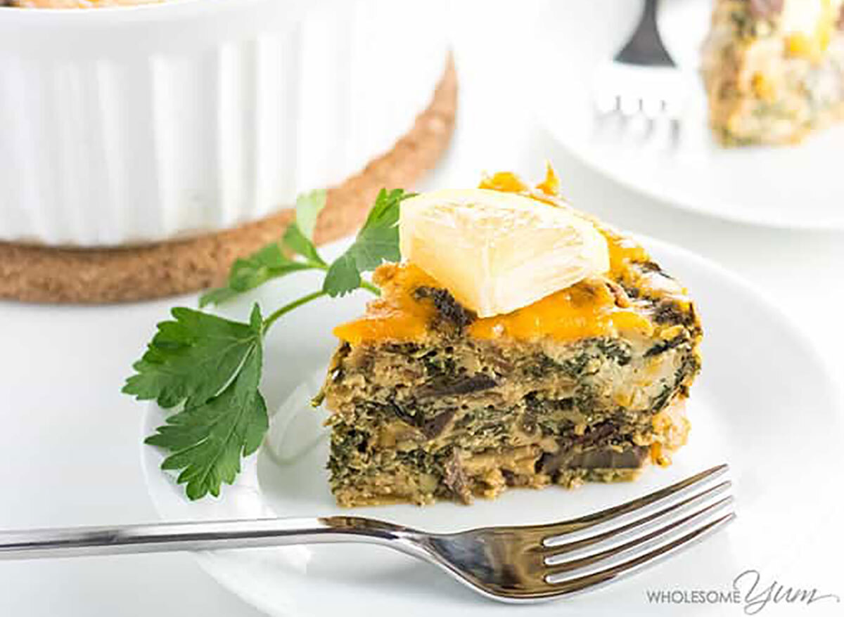 crustless quiche on white plate with fork