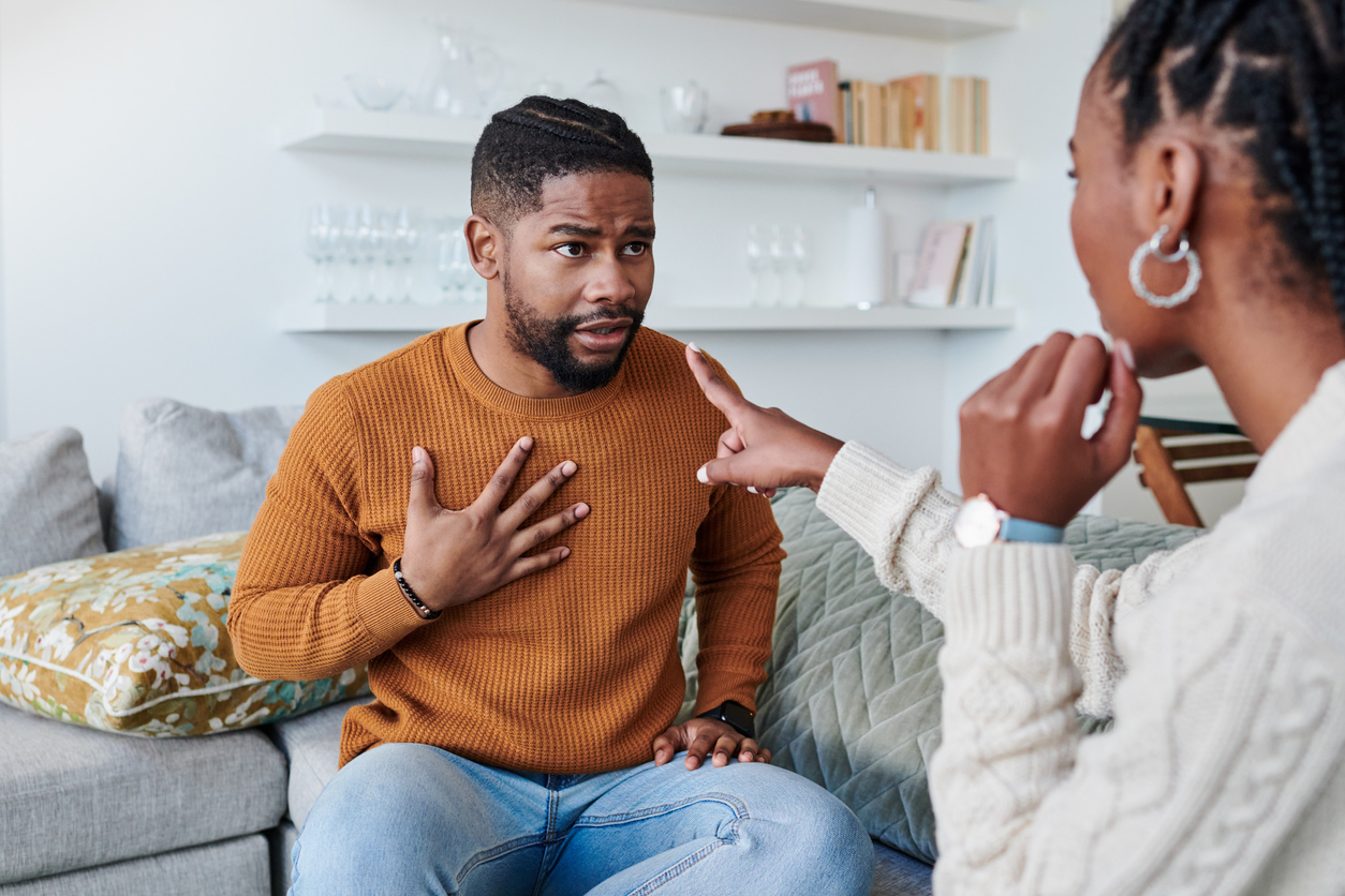 young black couple fighting