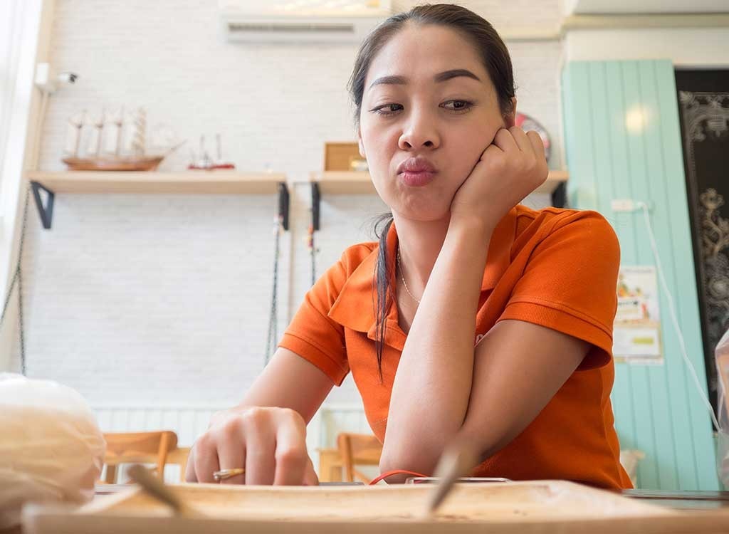 Woman annoying and grumpy at restaurant