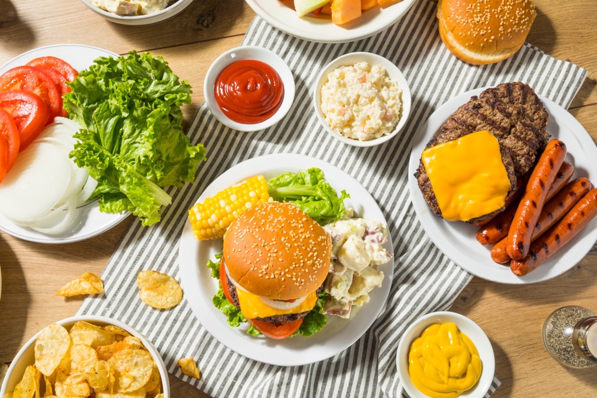 picnic foods on striped blanket