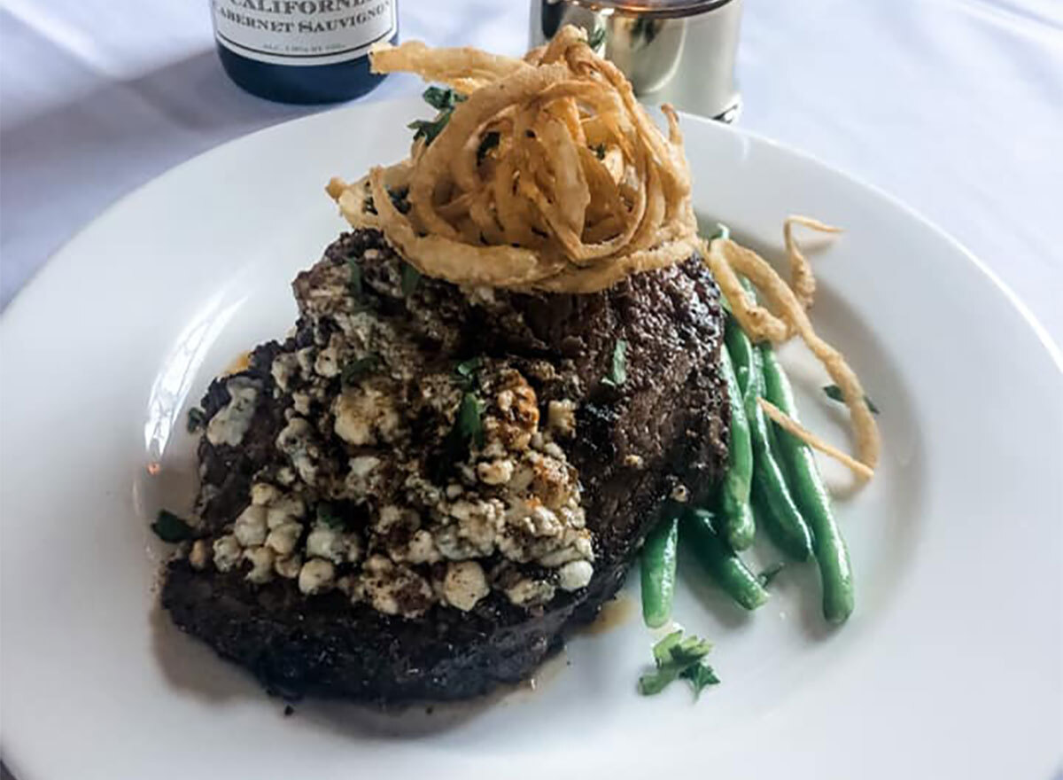 prime rib topped with bleu cheese crumbles and served with green beans