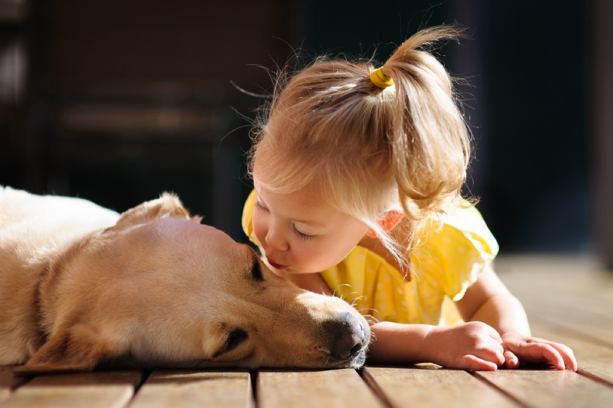 little girl playing with dog, things you should never lie to kids about