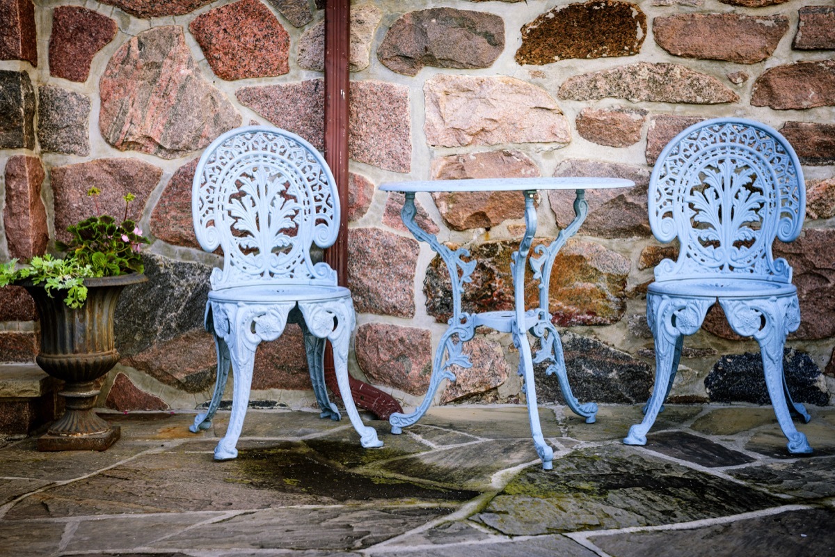 Painted outdoor furniture on patio