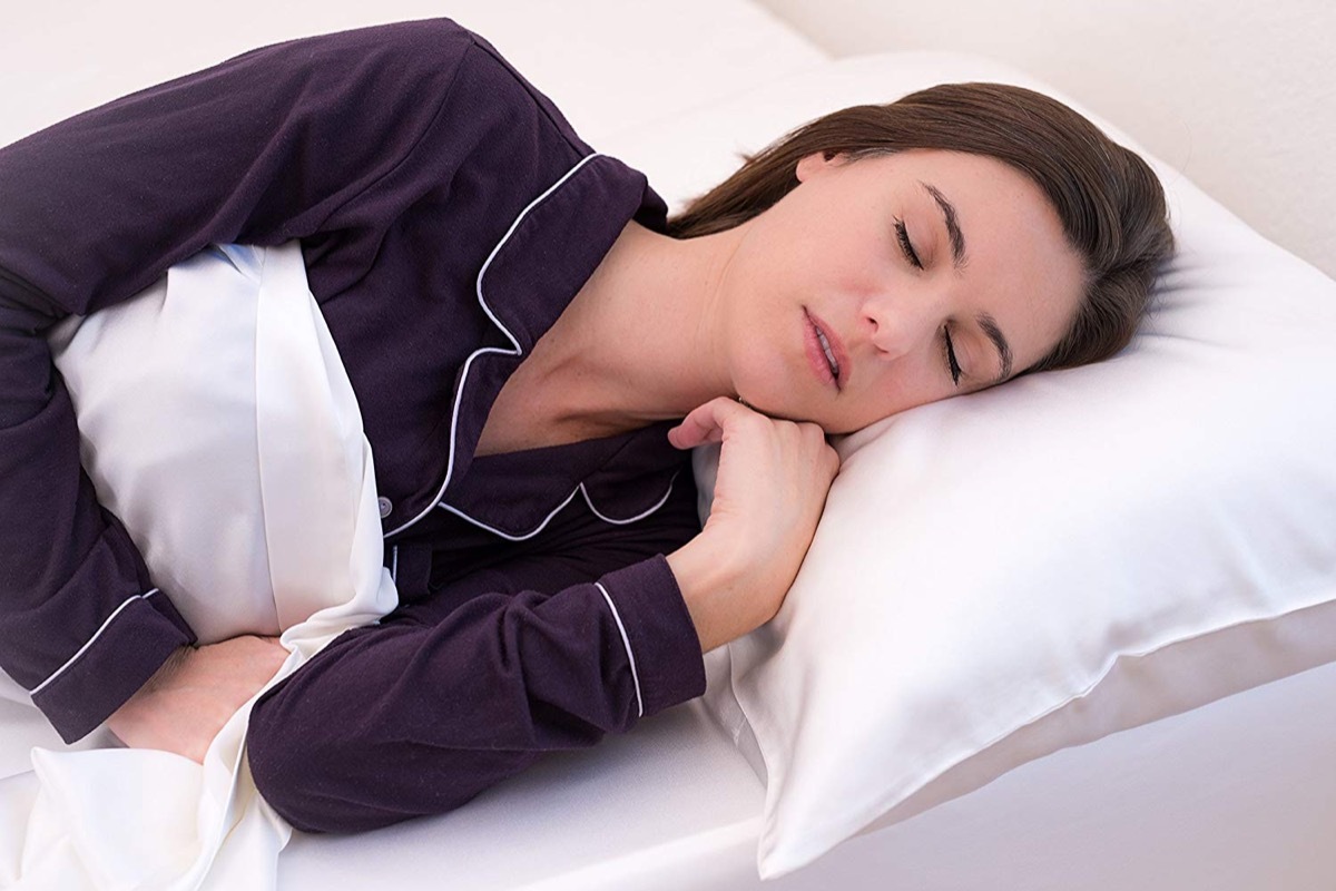 woman sleeping on silk pillowcase