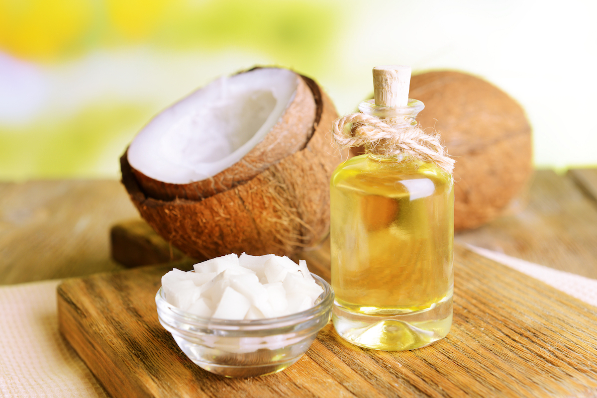 Coconut,Oil,On,Table,On,Light,Background