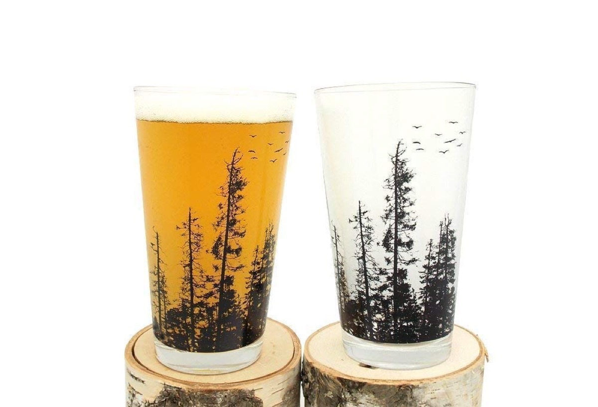 pint glasses with trees on them