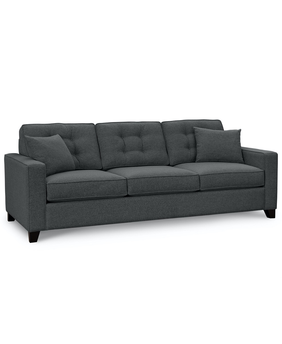 gray tufted sofa