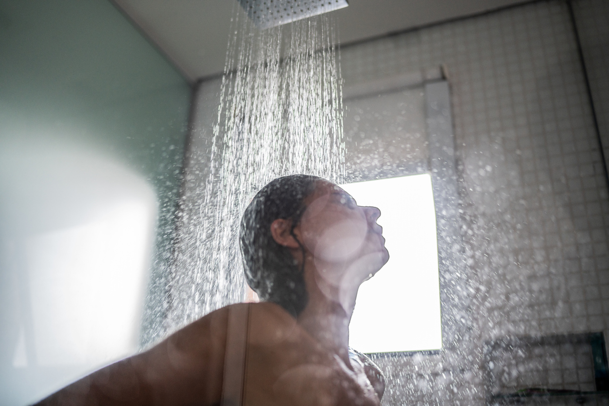 A woman taking a shower