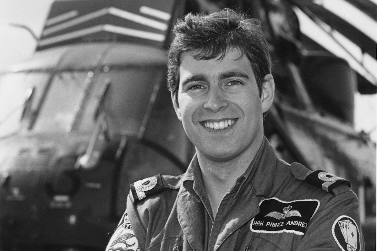 Andrew, Duke of York standing by a Royal Air Force helicopter, circa 1981